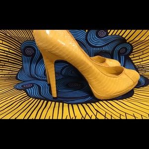 Ralph and Lauren yellow snake skins heels